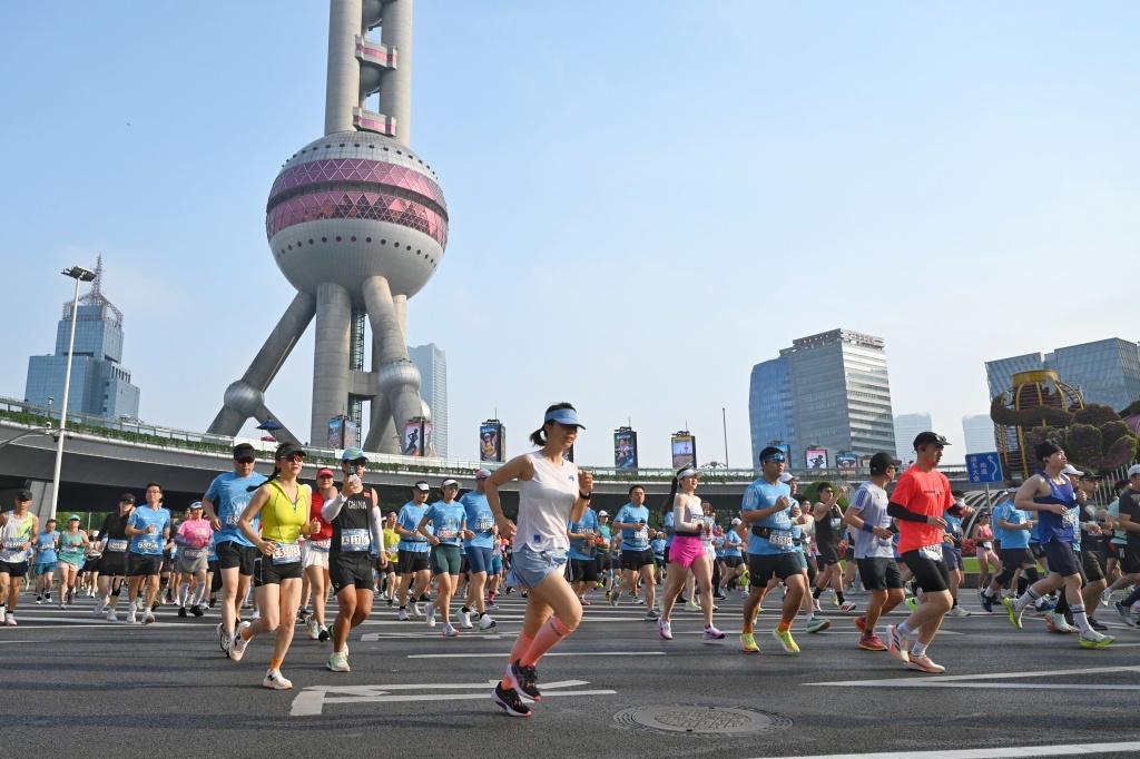 九游网络-十年能打磨出一场怎样的大众赛事？上海半马即将鸣枪给出答案
